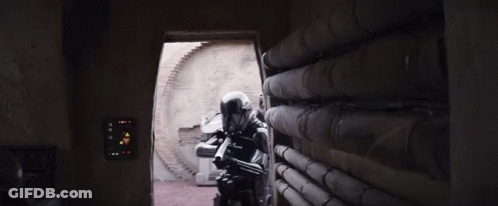 Black And White Photo Of Soldier In Room With Pipes GIF