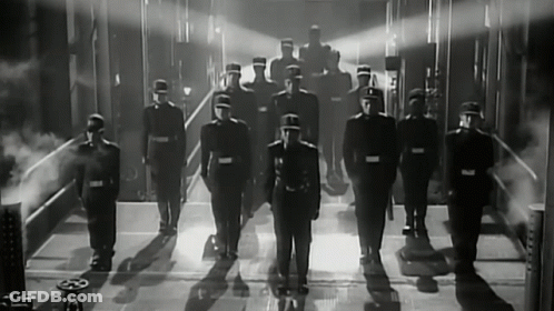 Black And White Photo Of Soldiers Standing In Line GIF