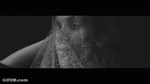 Black And White Photo Of Torso Covered In Towel GIF