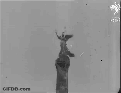Black And White Photo Of Tower With Pathe GIF