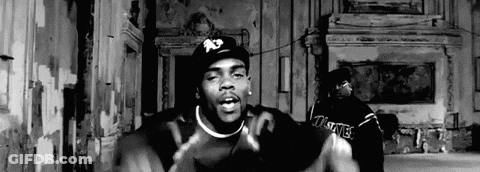 Black And White Photo Of Two Men Standing Together GIF