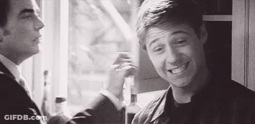 Black And White Photo Of Two Men GIF