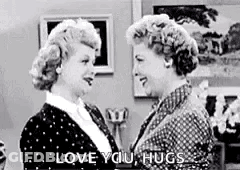 Black And White Photo Of Two Women Hugging Saying Love You Hugs GIF