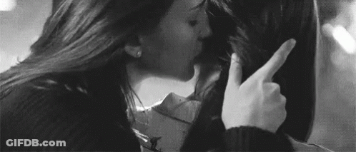 Black And White Photo Of Two Women Kissing GIF