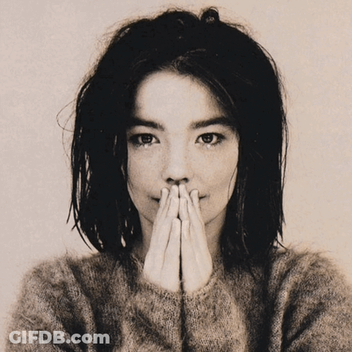 Black And White Photo Of Woman Covering Face With Hands GIF