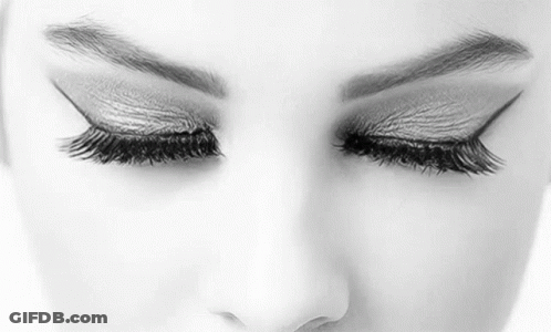 Black And White Photo Of Woman Eyes With Long Eyelashes GIF