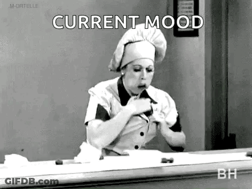 Black And White Photo Of Woman In Chef's Hat Eating Food GIF
