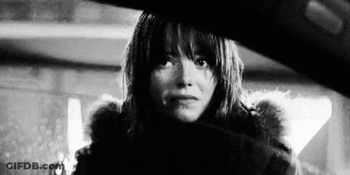 Black And White Photo Of Woman In Fur Coat And Fur Hood GIF
