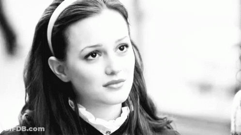 Black And White Photo Of Woman In Headband GIF