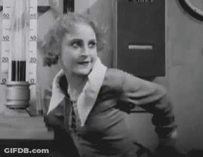 Black And White Photo Of Woman In Lab GIF