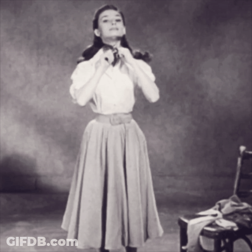 Black And White Photo Of Woman In Long Skirt GIF