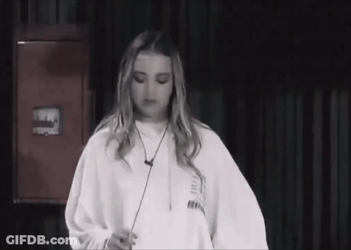 Black And White Photo Of Woman In Sweatshirt Saying Freedom GIF