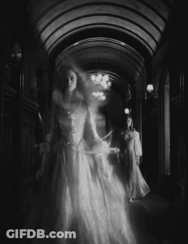 Black And White Photo Of Woman In White Dress GIF