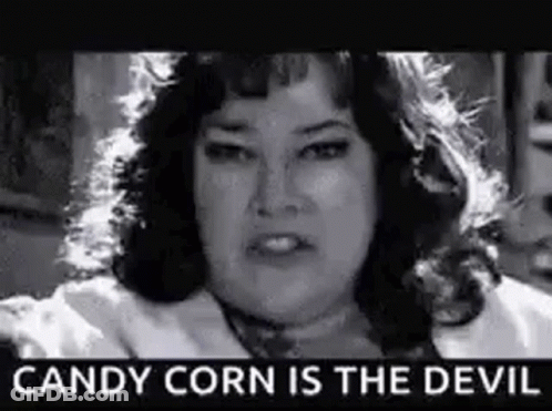 Black And White Photo Of Woman Saying Candy Corn Is The Devil GIF