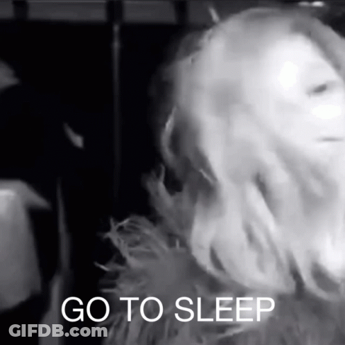 Black And White Photo Of Woman Saying Go To Sleep GIF