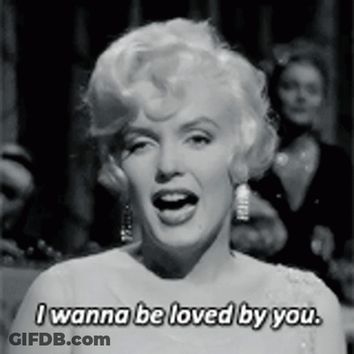 Black And White Photo Of Woman Saying I Wanna Be Loved By You GIF