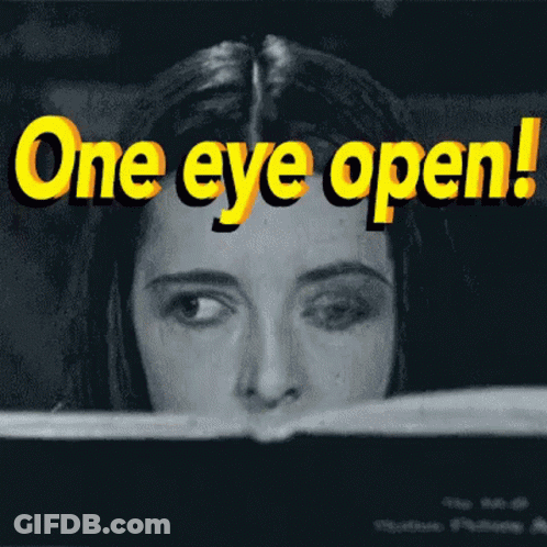 Black And White Photo Of Woman Saying One Eye Open GIF