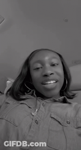 Black And White Photo Of Woman Smiling With Button GIF