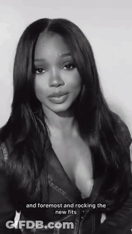 Black And White Photo Of Woman With And Foremost And Rocking The New Fits GIF
