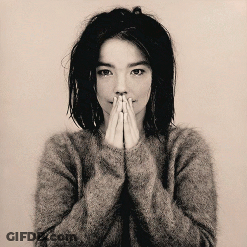 Black And White Photo Of Woman With Folded Hands GIF