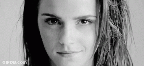 Black And White Photo Of Woman With Long Hair Smiling GIF