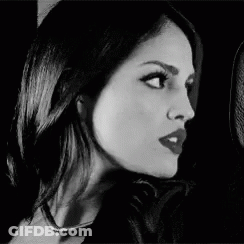 Black And White Photo Of Woman With Red Lipstick And Choker GIF