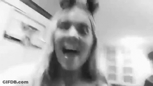 Black And White Photo Of Woman With Tongue Out GIF