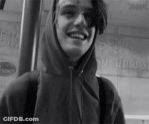Black And White Photo Of Young Man In Hoodie GIF