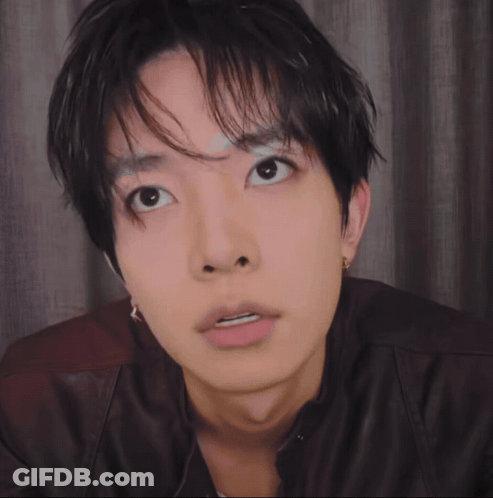 Black And White Photo Of Young Man With Eyes Closed GIF