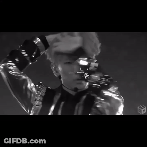 Black And White Photo Of Young Man With Microphone GIF