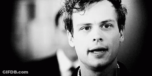 Black And White Photo Of Young Man With Mouth Open GIF