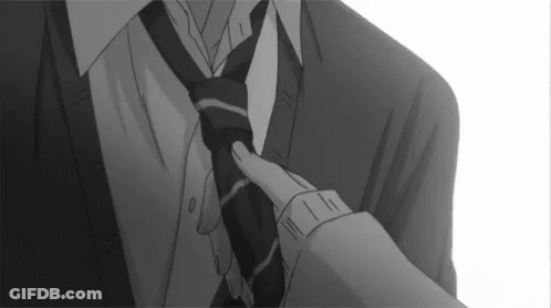 Black And White Photo Person Adjusting Tie GIF