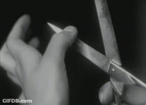 Black And White Photo Person Holding Scissors GIF