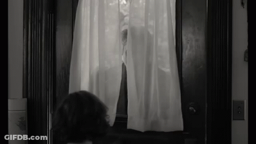 Black And White Photo Person Looking Out Window GIF