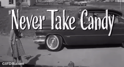 Black And White Photo Saying Never Take Candy GIF