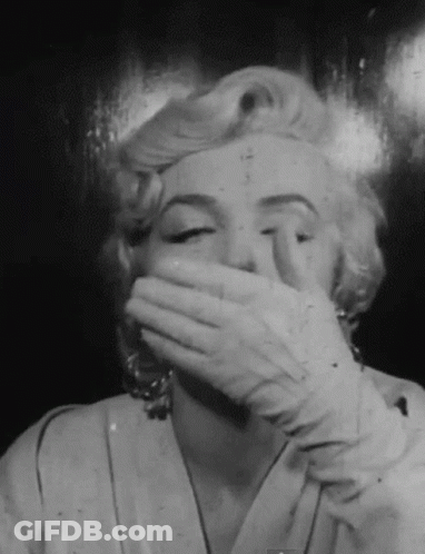 Black And White Photo Woman Covering Mouth GIF