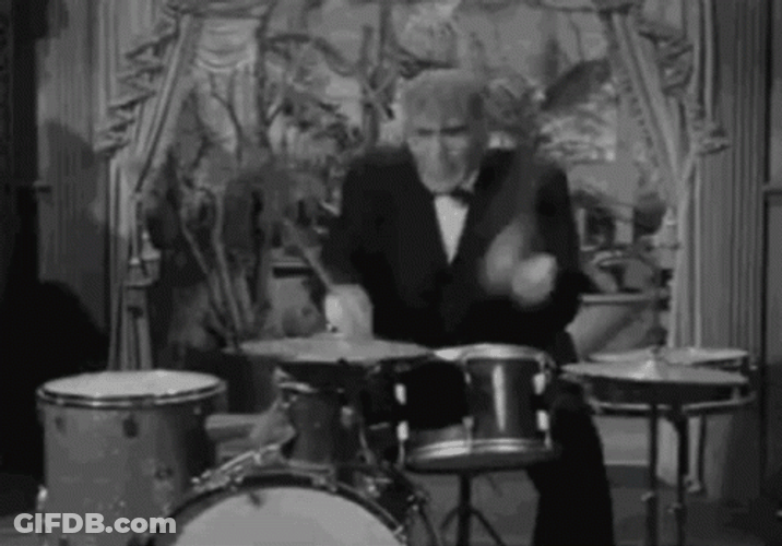 Black And White Playing Drum GIF