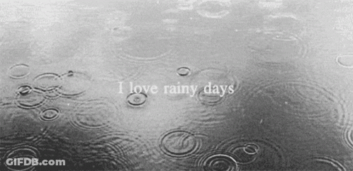 Black And White Raindrops Saying I Love Rainy Days GIF