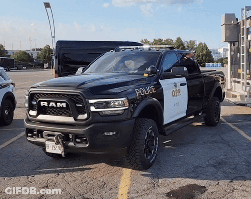 Black And White Ram Truck With Police GIF