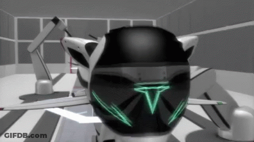 Black And White Robot With Green T On Face GIF