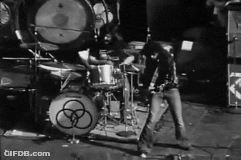 Black And White Rock Band Playing Drums GIF