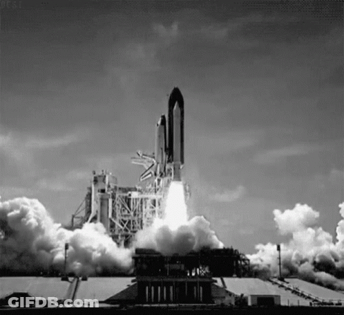 Black And White Rocket Launching Into Space GIF