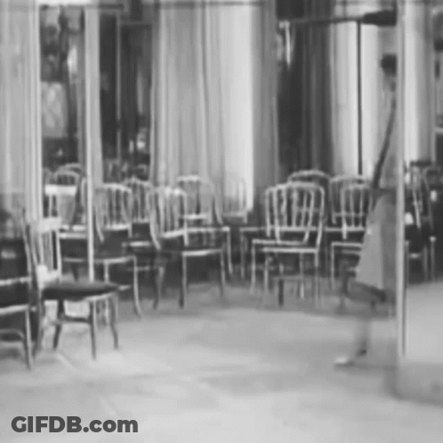 Black And White Row Of Chairs GIF