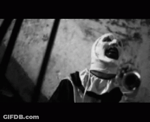 Black And White Scary Clown In Nun Costume Screaming GIF
