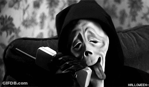 Black And White Scream Mask Person Talking On Cell Phone GIF