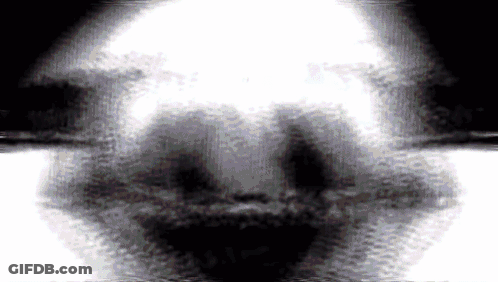 Black And White Skull With Light Behind GIF