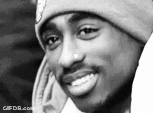 Black And White Smiling Man In Beanie GIF
