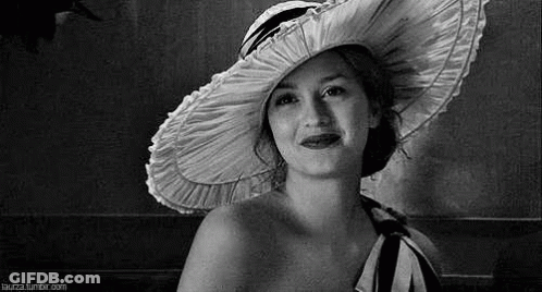 Black And White Smiling Woman In Large Hat GIF