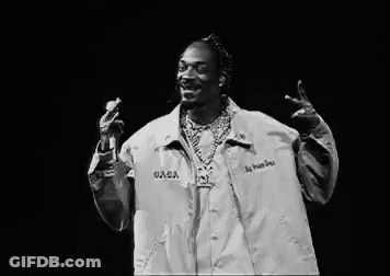 Black And White Snoop Dogg Singing Into Microphone GIF