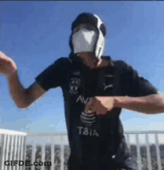Black And White Soccer Player Kicking Ball GIF